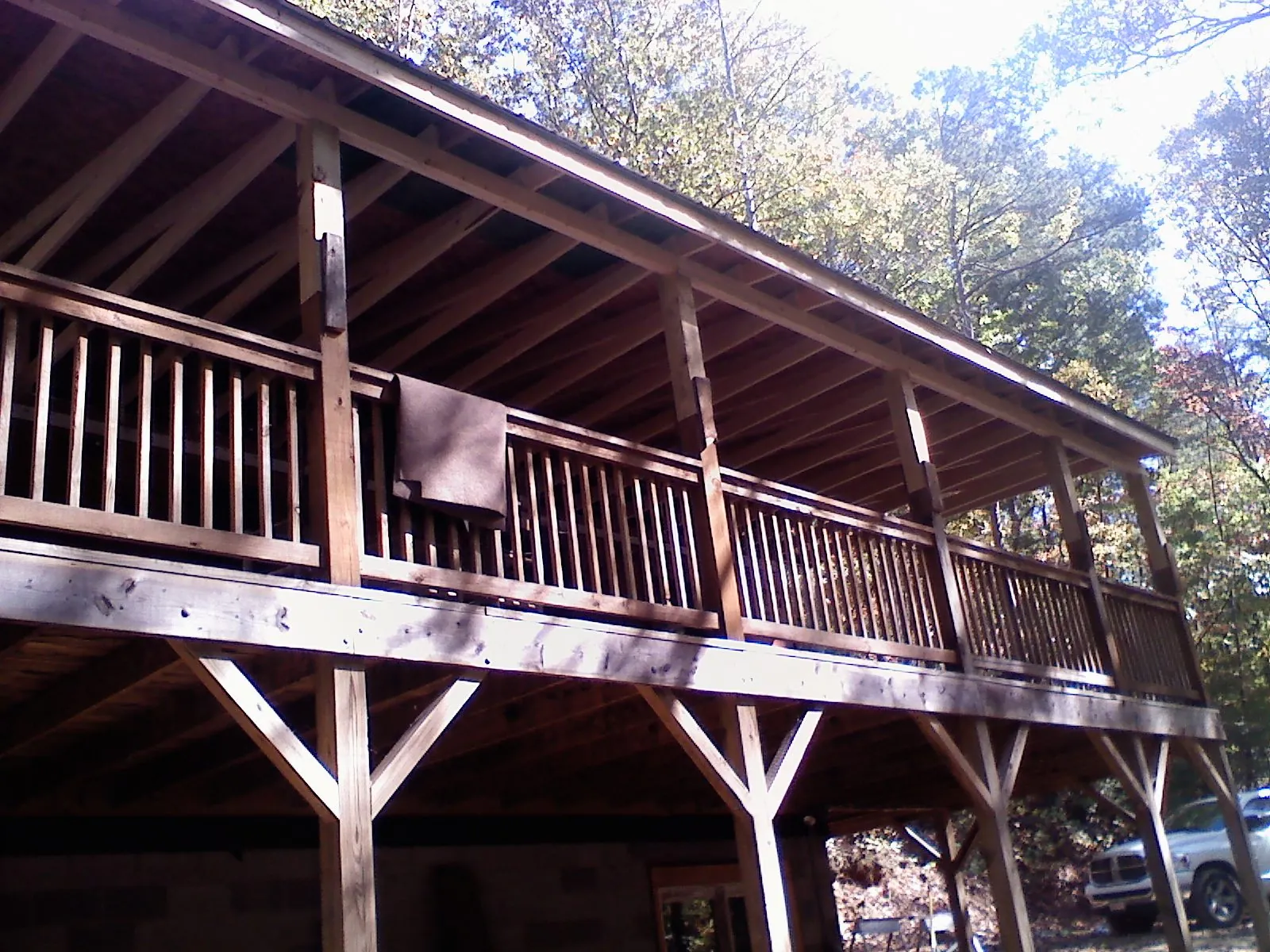 Timber framing under a new elevated porch and deck — Roof Leak Repair in Francis Creek by Roofing Brothers